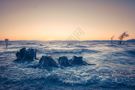 海浪礁石背景图片