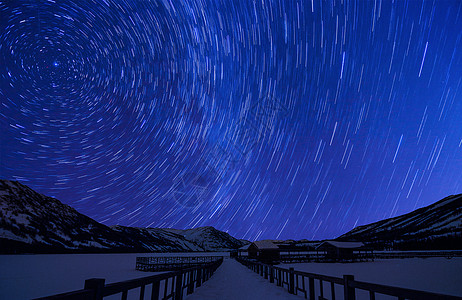 山峰小道星轨背景设计图片