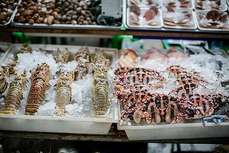 吃蟹海鲜市场摊贩背景