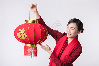 新春汉服美女手拿灯笼祝贺图片