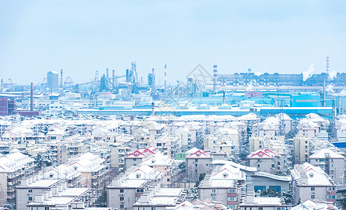 第一场雪上海工厂居民楼雪景背景