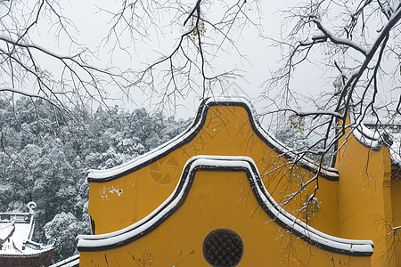 雪中的寺庙古典建筑佛墙高清图片