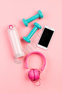 跑步手机女性粉色健身静物背景背景
