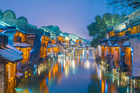 浙江嘉兴浙江乌镇雪后夜景背景