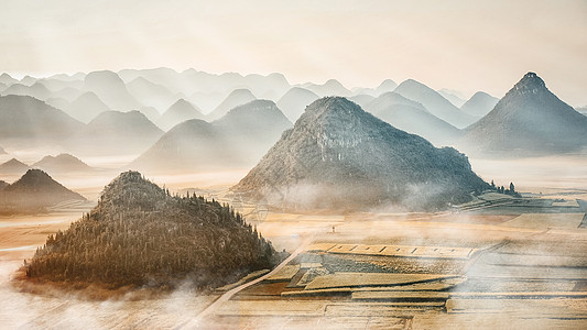 金鸡峰丛罗平金鸡峰的油菜花背景