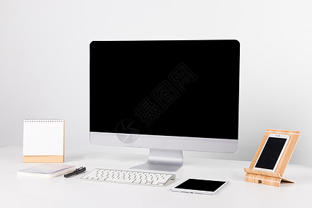 桌面整洁简约的电脑办公桌背景