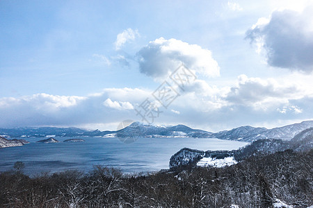 蓝色雪花日本北海道洞爷湖风光图背景