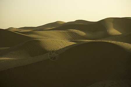 新疆塔克拉玛干沙漠线条纹理素材背景图片