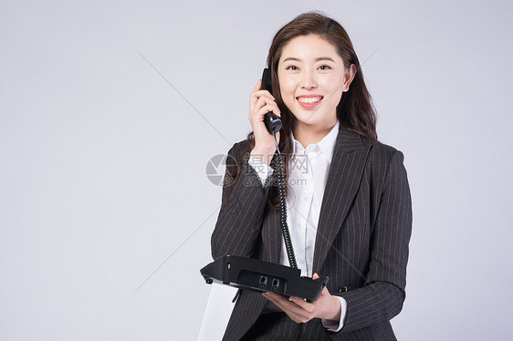 商务女性打电话图片