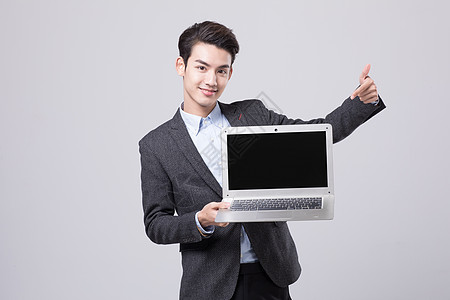 男士西装青年商务男性展示电脑背景