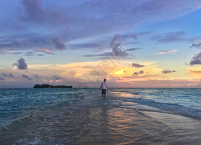 巴厘岛海滩日落背景图片