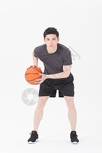 青年男性打篮球运球背景