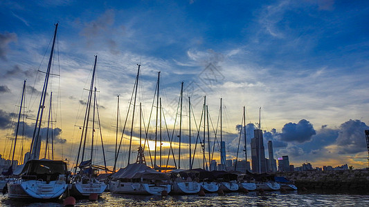 香港仔避风塘香港避风塘傍晚夕阳下的港湾船舶帆船背景