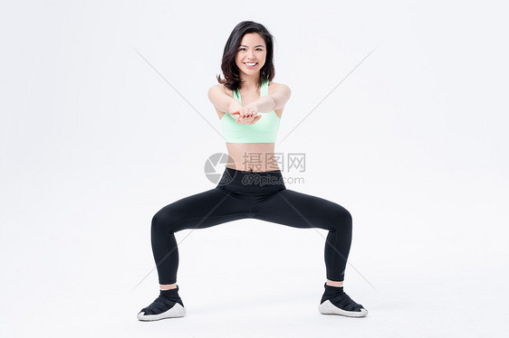 运动健身女性蹲马步