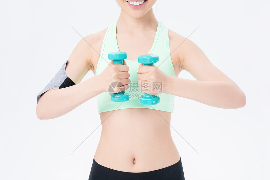 年轻女性哑铃健身锻炼图片
