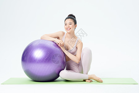 健身美女年轻女性瑜伽球瑜伽背景