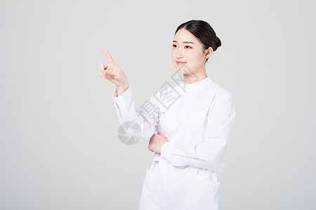 手指点向前方的女护士形象图片