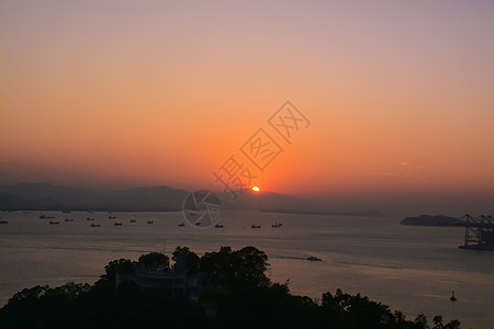 鼓浪屿码头厦门鼓浪屿海边船只日落背景