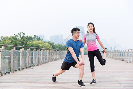 健身美女年轻男女户外运动健身运动背景