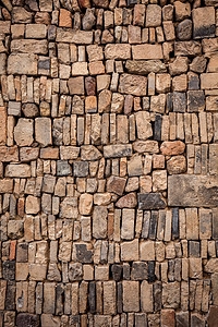 墙体材料山区石块垒起的石墙背景