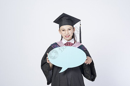 拿着文字框的毕业女学生图片