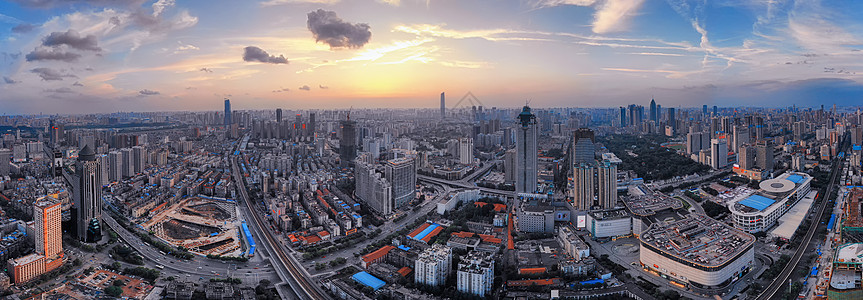 夕阳下的城市全景街拍高清图片