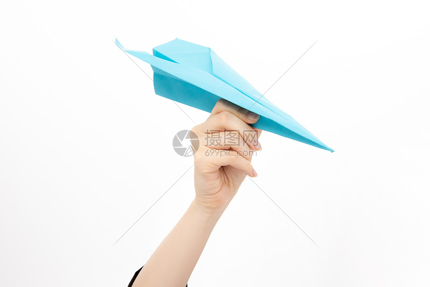 手拿纸飞机的人图片