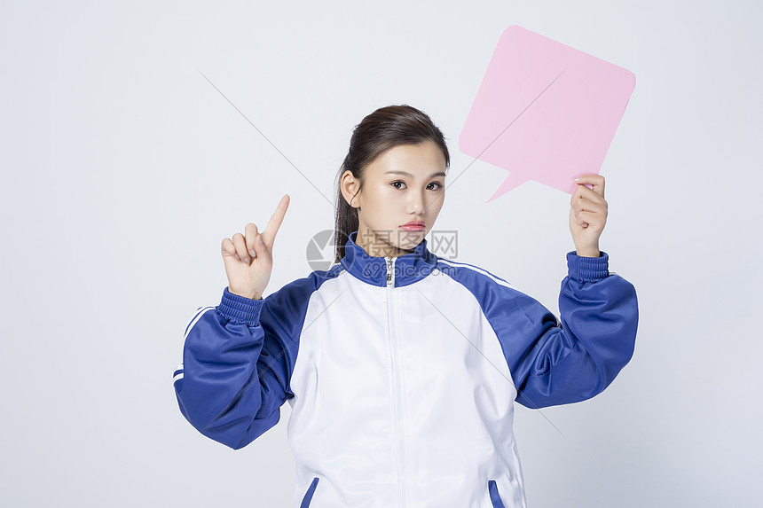 拿着对话框的女学生图片