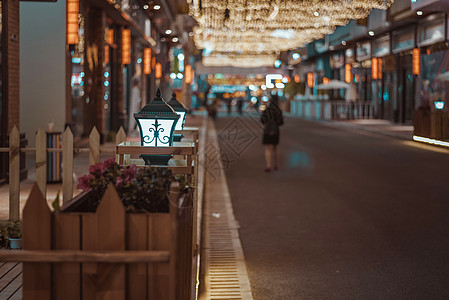 街上行人步行街道夜景背景