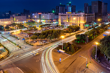 繁华街景汉口火车站前广场夜景背景