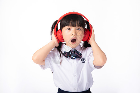 戴耳机听音乐的小女生高清图片