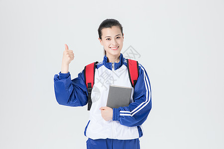 女性学生校服书包形象背景图片