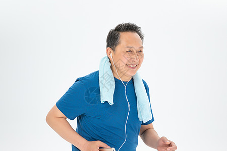 健身听歌运动中听歌的老年人背景