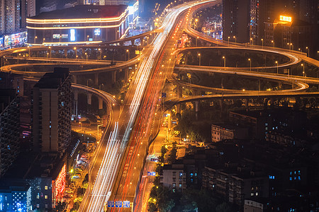 城市立交桥车轨夜景背景图片