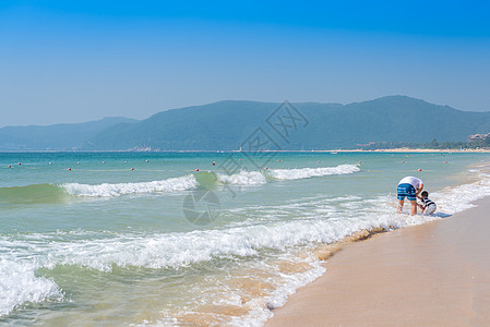 沙滩烧烤海南三亚亚龙湾风光背景