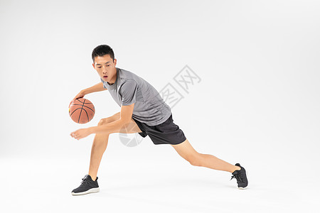 打篮球运动员篮球运动员运球动作背景