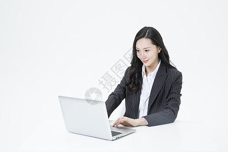 商务女性办公笔记本电脑背景图片
