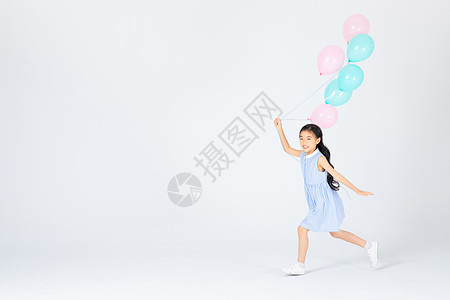 拿气球的小女孩背景图片