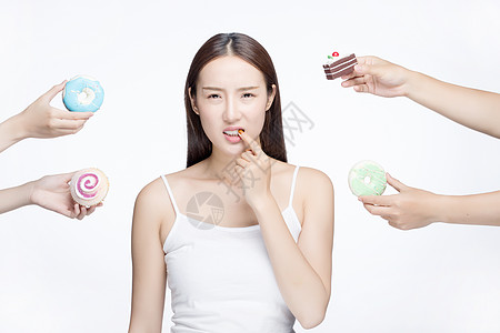 女性吃甜品蛀牙图片