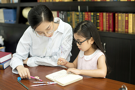 小学生卡通老师辅导学生功课背景