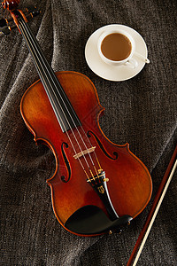 小提琴乐器大提琴静物拍摄产品背景图片