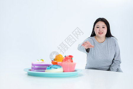 胖女生与甜食图片