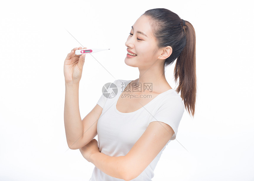 美女看温度计图片