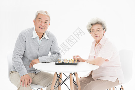 老年夫妇下棋背景图片