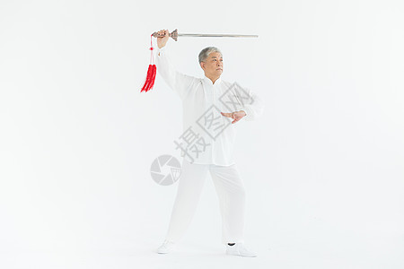 老年健身老年男性太极剑锻炼形象背景