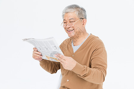 老人看报纸老年人戴眼镜看报纸背景