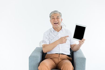 老年人和平板电脑图片