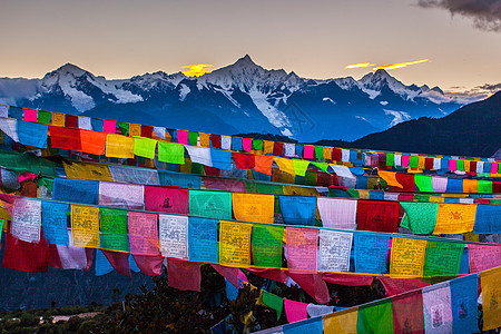 夕阳风景云南迪庆德钦县梅里雪山日落背景