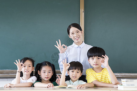 小学生ok手势女教师和小学生OK手势背景