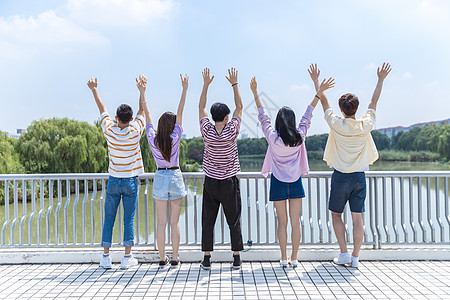 双手高举大学生高举双手背景